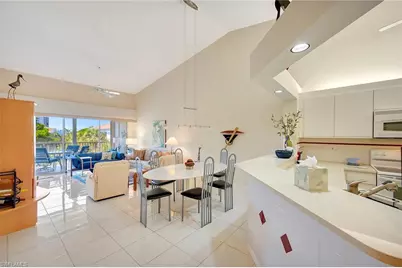 7654 Pebble Creek Cir #303, Naples, FL 34108 - Photo 2