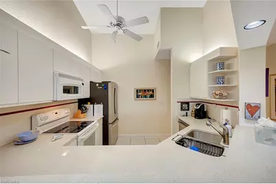 7654 Pebble Creek Cir #303, Naples, FL 34108 - Photo 14