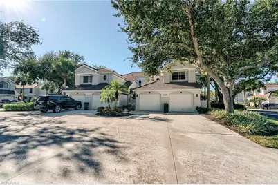 25203 Pelican Creek Cir #102, Bonita Springs, FL 34134 - Photo 1