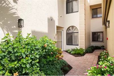 7048 Pelican Bay Blvd #C104, Naples, FL 34108 - Photo 18