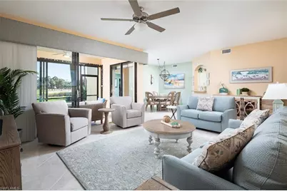 7048 Pelican Bay Blvd #C104, Naples, FL 34108 - Photo 2