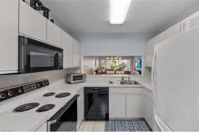 10686 Gulf Shore Dr #A-104, Naples, FL 34108 - Photo 12