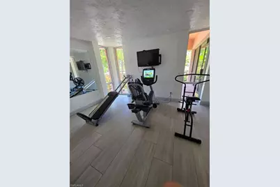 160 Turtle Lake Ct #209, Naples, FL 34105 - Photo 1