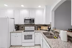 7715 Woodbrook Cir, Naples, FL 34104 - Photo 12