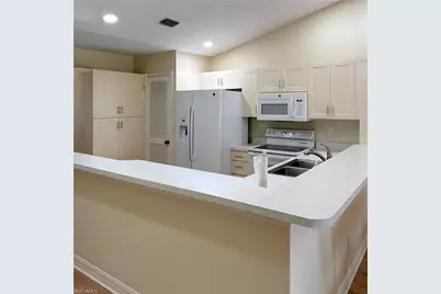 5035 Cedar Springs Dr #203, Naples, FL 34110 - Photo 8