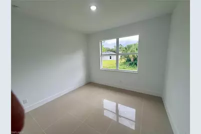 523 Harry Thayer Ave S, Lehigh Acres, FL 33974 - Photo 20