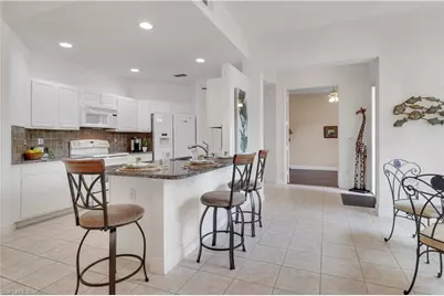 994 Eastham Way #V101, Naples, FL 34104 - Photo 2