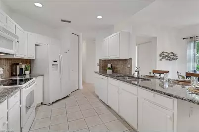 994 Eastham Way #V101, Naples, FL 34104 - Photo 6