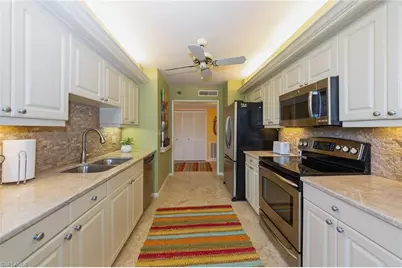 6000 Pelican Bay Blvd #C-204, Naples, FL 34108 - Photo 6