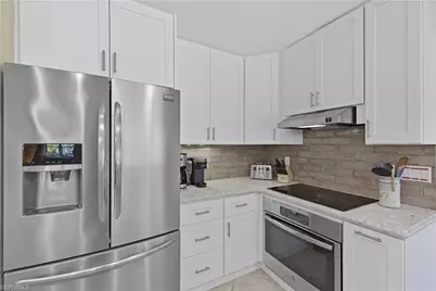 2261 Kings Lake Blvd, Naples, FL 34112 - Photo 12