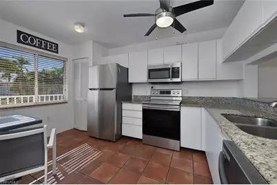 3021 Sandpiper Bay Cir #E206, Naples, FL 34112 - Photo 8