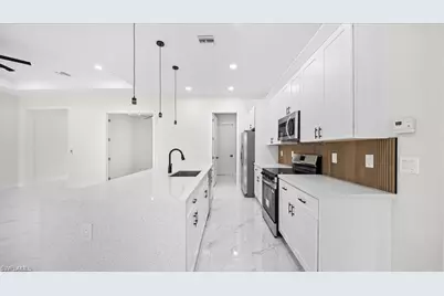 922 Richmond Ave N, Lehigh Acres, FL 33972 - Photo 22