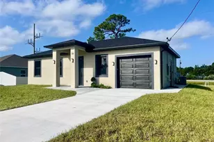 56 Floyd Ave S, Lehigh Acres, FL 33976 - Photo 1