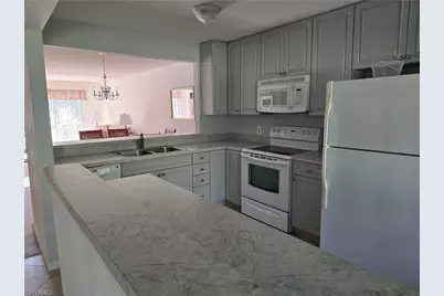 5622 Woodmere Lake Cir #B102, Naples, FL 34112 - Photo 2