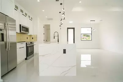 311 Ranier Ave, Lehigh Acres, FL 33974 - Photo 6