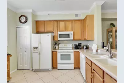 6824 Sterling Greens Pl #3303, Naples, FL 34104 - Photo 8