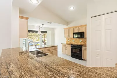 736 Wiggins Lake Dr #202, Naples, FL 34110 - Photo 10