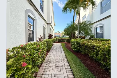 6817 Sterling Greens Dr #8102, Naples, FL 34104 - Photo 2