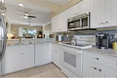 8680 Cedar Hammock Cir #134, Naples, FL 34112 - Photo 4