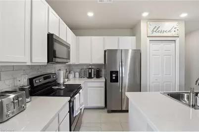 15388 Wildflower Cir, Naples, FL 34119 - Photo 6