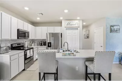 15388 Wildflower Cir, Naples, FL 34119 - Photo 8