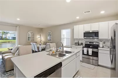 15388 Wildflower Cir, Naples, FL 34119 - Photo 10