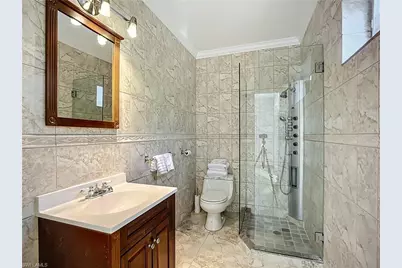 10242 Vanderbilt Dr, Naples, FL 34108 - Photo 24