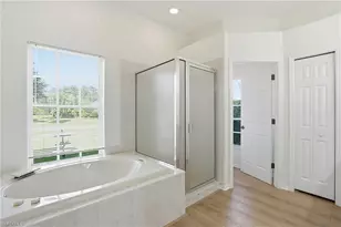 571 Chamonix Ave S, Lehigh Acres, FL 33974 - Photo 14