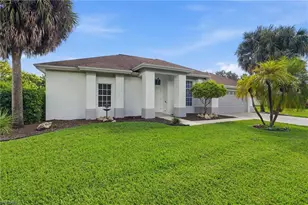 571 Chamonix Ave S, Lehigh Acres, FL 33974 - Photo 1
