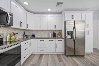 4650 Yacht Harbor Dr #121, Naples, FL 34112 - Photo 10