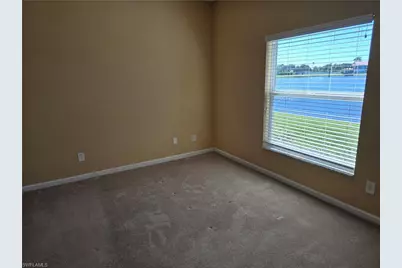 25069 Peacock Ln #101, Naples, FL 34114 - Photo 16
