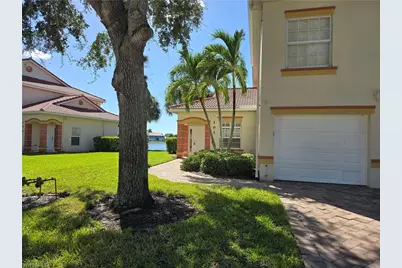 25069 Peacock Ln #101, Naples, FL 34114 - Photo 2