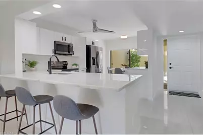 15450 Cedarwood Ln #103, Naples, FL 34110 - Photo 4