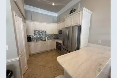 2276 Heritage Greens Dr, Naples, FL 34119 - Photo 16