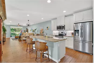 14891 Edgewater Cir, Naples, FL 34114 - Photo 4