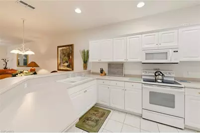 4863 Hampshire Ct #106, Naples, FL 34112 - Photo 6
