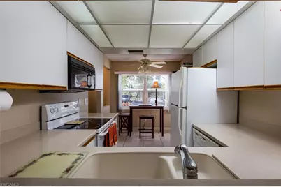 109 Wading Bird Cir #V-104, Naples, FL 34110 - Photo 4