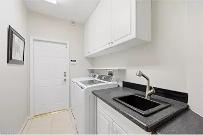 3033 Olde Cove Way, Naples, FL 34119 - Photo 44