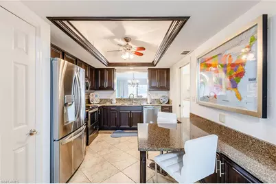 6350 Pelican Bay Blvd #B-105, Naples, FL 34108 - Photo 10