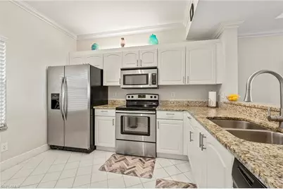 992 Woodshire Ln #D205, Naples, FL 34105 - Photo 4