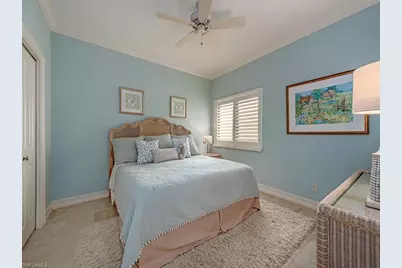 7032 Pelican Bay Blvd #E202, Naples, FL 34108 - Photo 10