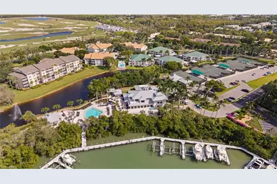 585 Club Side Dr #3-104, Naples, FL 34110 - Photo 2