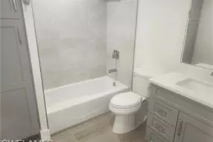 141 Cypress Way E, Naples, FL 34110 - Photo 4