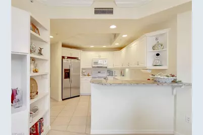 1001 Arbor Lake Dr #105, Naples, FL 34110 - Photo 12