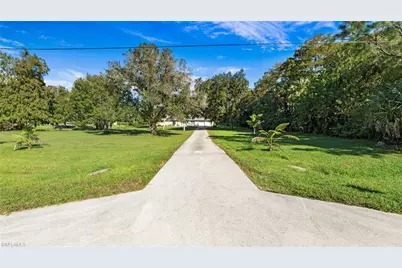 410 11th St NW, Naples, FL 34120 - Photo 2