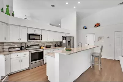 12970 Kelly Greens Blvd, Fort Myers, FL 33908 - Photo 8