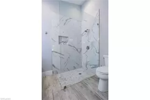 1511 Whispering Oaks Cir, Naples, FL 34110 - Photo 12