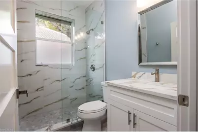 1511 Whispering Oaks Cir, Naples, FL 34110 - Photo 18