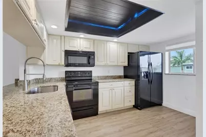 146 Cypress Way E #7, Naples, FL 34110 - Photo 4