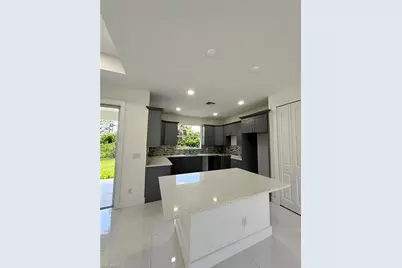718 Chattman St E, Lehigh Acres, FL 33974 - Photo 6